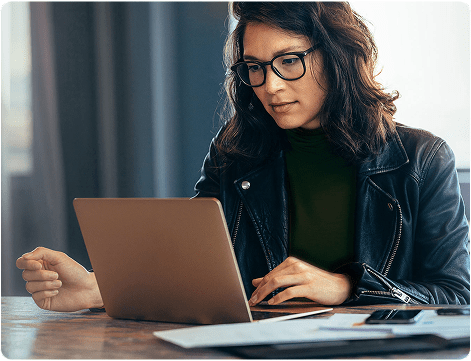 Lady looking at screen during fraud